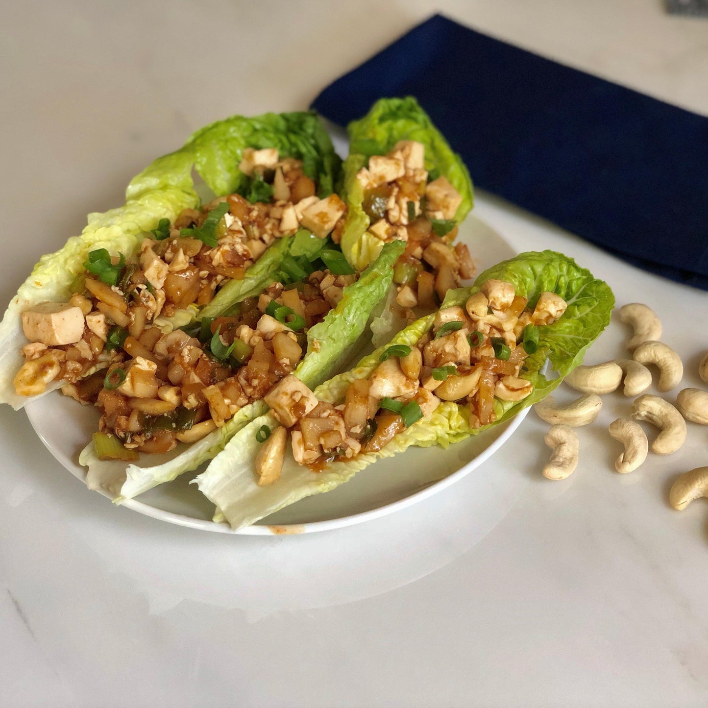 Sriracha Tofu Cashew Lettuce Wraps - KARMA NUTS